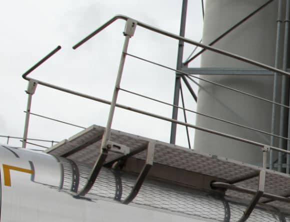 Catwalk with twin ground level operated Handrails