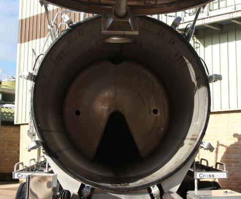 Baffled tank with intermediate washout manways